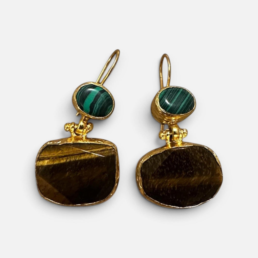 Jakris Stone Duo earrings featuring natural malachite and tiger eye stones in gold-toned organic frames.