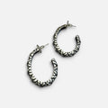 Jakris silver-plated hoop earrings with a textured surface and post back closure for a modern, stylish look.