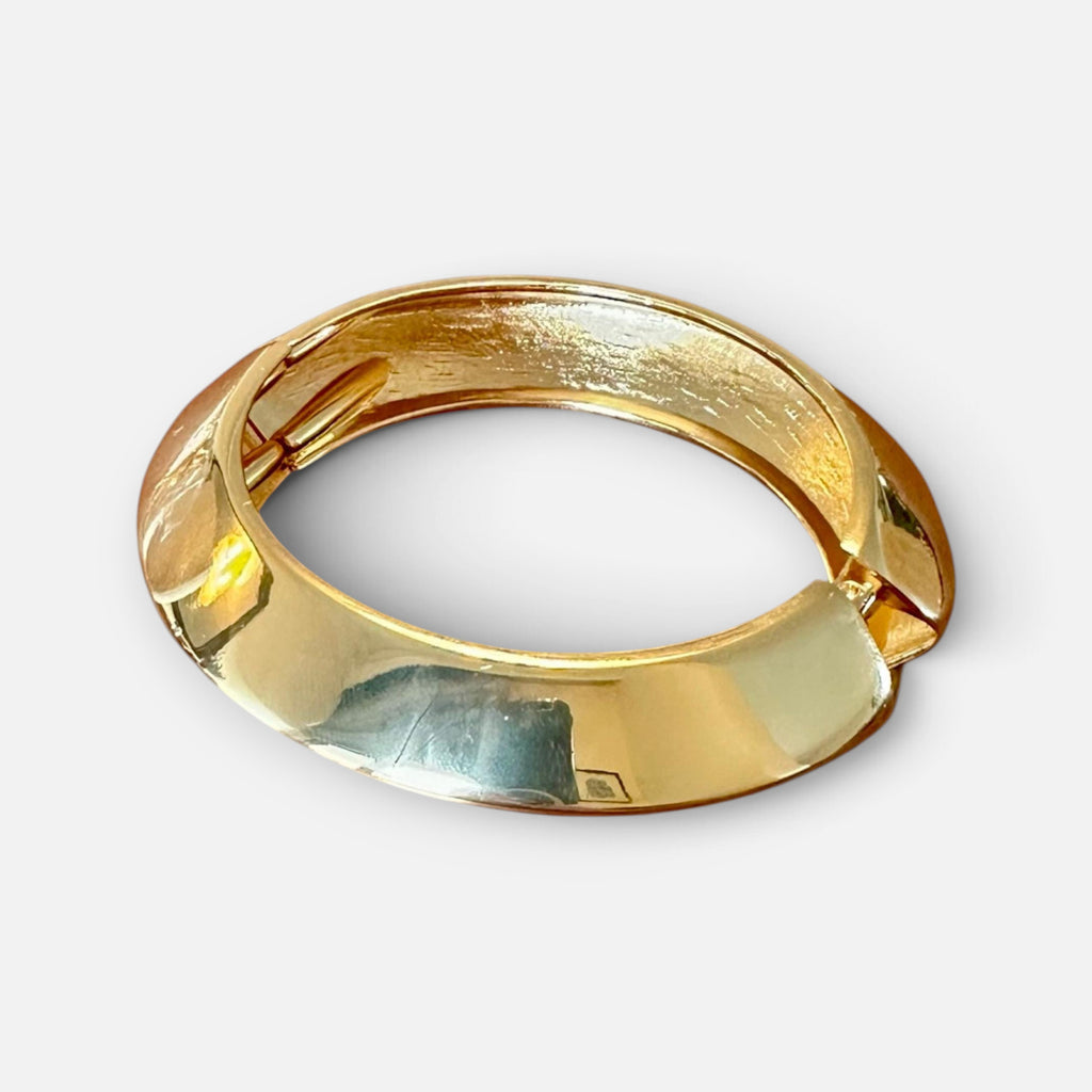 Jakris thick gold-plated geometric hinged cuff bracelet with a polished finish