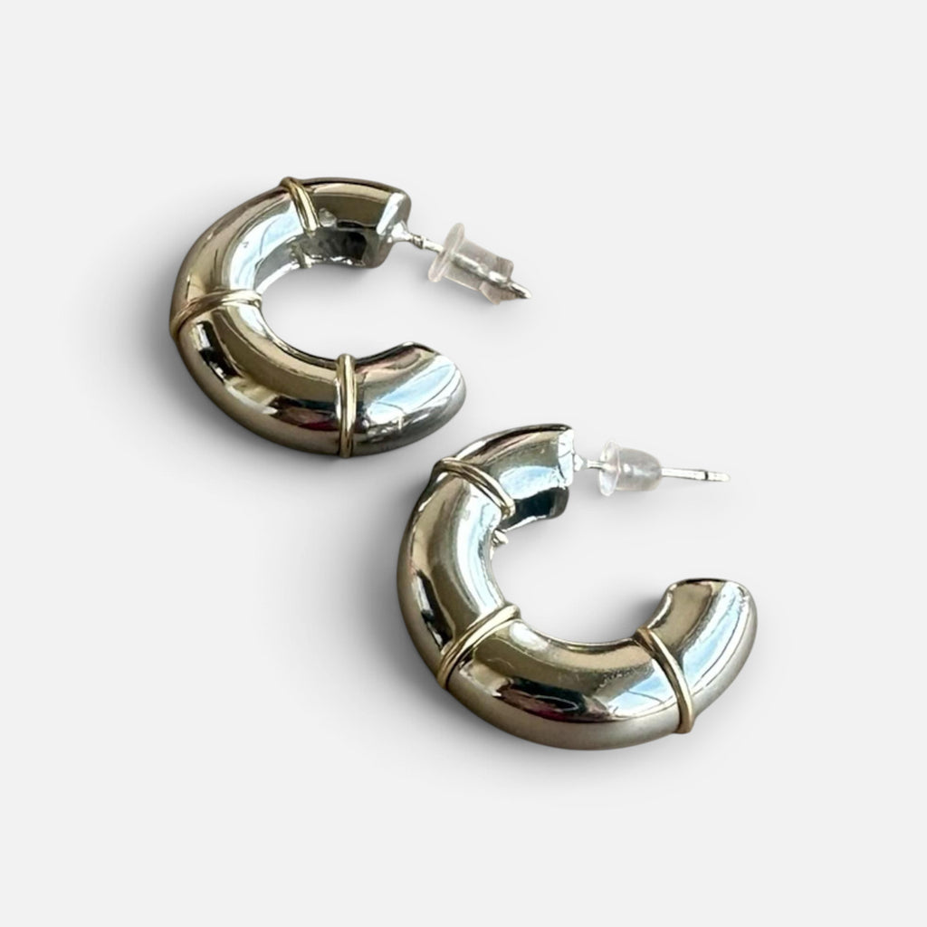 Jakris thick silver hoop earrings with gold-tone bamboo-style detailing and secure post backs.