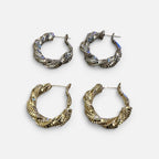 Jakris shiny twisted hoop earrings in gold and silver tones, featuring a textured metallic finish for party wear.