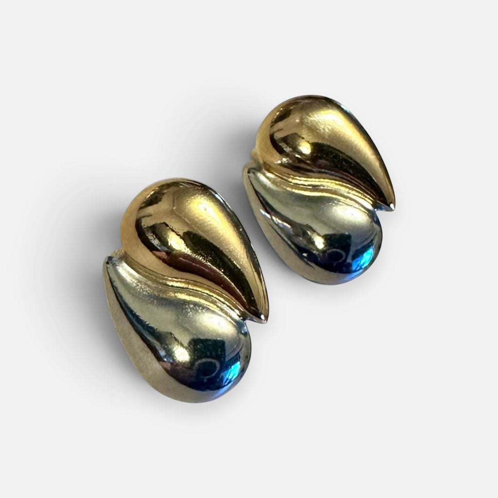 Jakris two-tone teardrop earrings featuring a polished gold and silver plated modern sculptural design