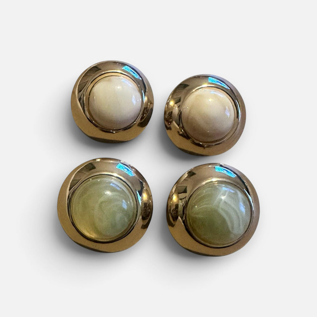Jakris vintage round earrings featuring cream and green cabochon stones set in polished gold-tone metal