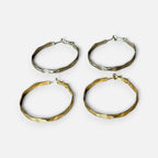 Jakris wavy hoop earrings in gold and silver tones, featuring a lightweight textured design.