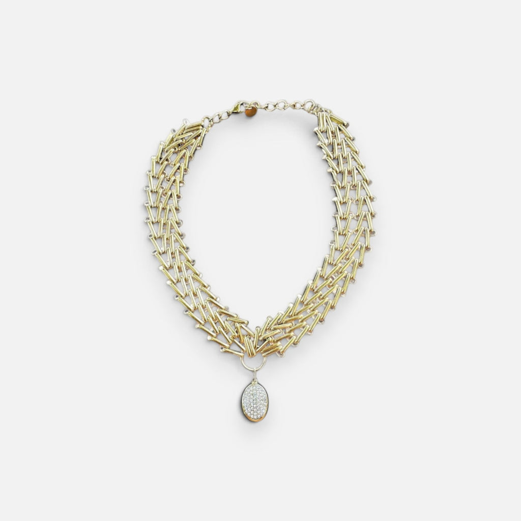 Jakris Zafira gold-tone multi-strand braided chain necklace with a central oval crystal-embellished pendant.