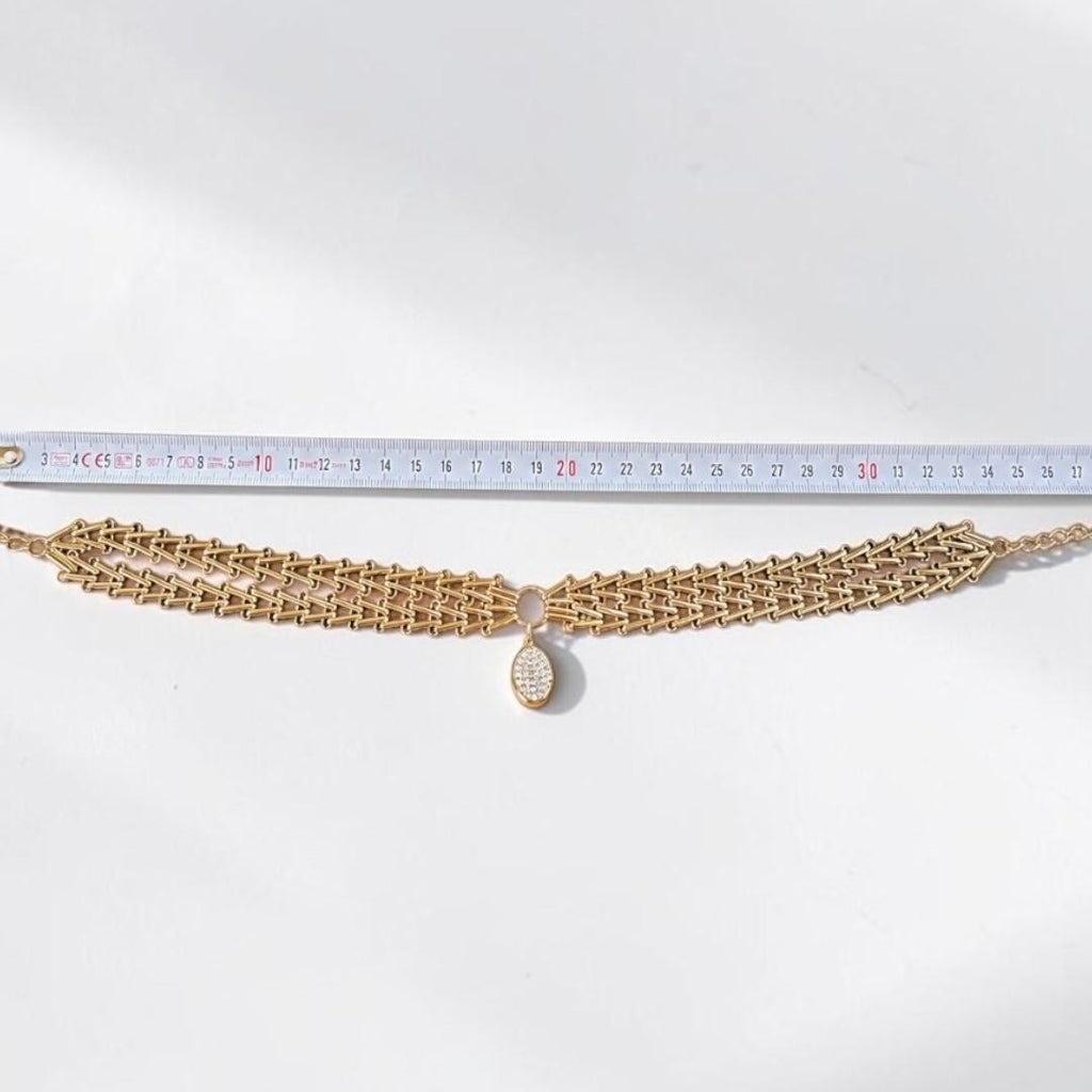 Jakris Zafira gold-plated brass multi-strand woven chain necklace with a crystal-embellished oval pendant