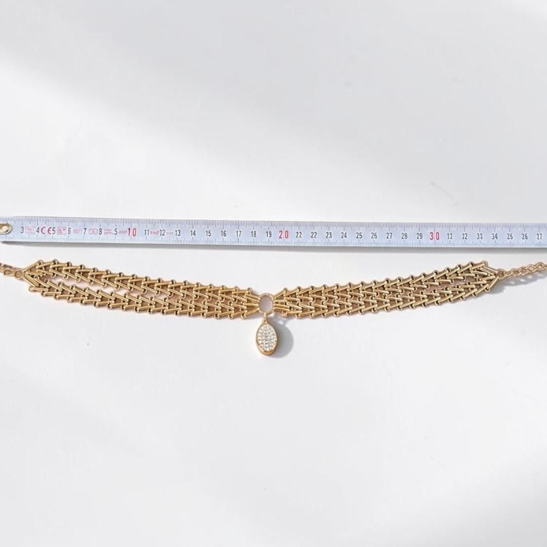 Jakris Zafira gold-plated brass multi-strand woven chain necklace with a crystal-embellished oval pendant